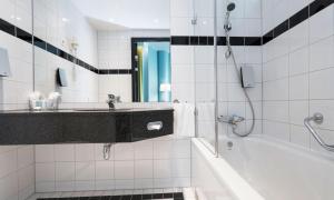 Koupelna v ubytování Thon Hotel Arena