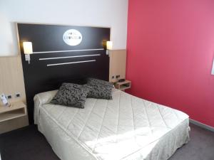Katil atau katil-katil dalam bilik di Hotel Lyon Sud, Pierre Benite, St Genis Laval