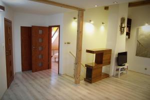 TV a/nebo společenská místnost v ubytování Apartament Aesthetic