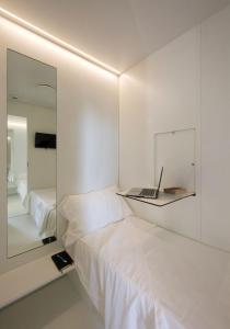 Llit o llits en una habitació de Bed & Boarding