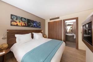 Postel nebo postele na pokoji v ubytování Be Live Experience Marrakech Palmeraie - All Inclusive