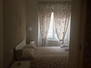 Postel nebo postele na pokoji v ubytování B&B Via Fontana Milano