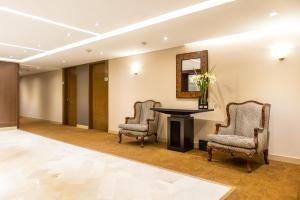 Postel nebo postele na pokoji v ubytování Hotel Dann Carlton Bogota
