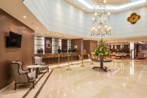TV a/nebo společenská místnost v ubytování Hotel Dann Carlton Bogota