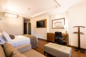 TV a/nebo společenská místnost v ubytování Hotel Dann Carlton Bogota