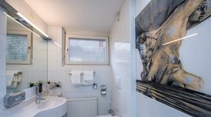Ein Badezimmer in der Unterkunft Hotel Neutor Express