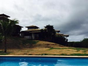 The swimming pool at or close to Maravilhosa casa em Buzios