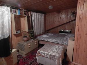 Postel nebo postele na pokoji v ubytování Садиба Достаток