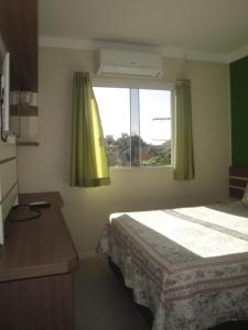 Imagen de la galería de excelente apto de 3 quartos com suite e vista mar, en Florianópolis
