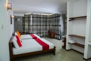 Postel nebo postele na pokoji v ubytování Ella Mansion