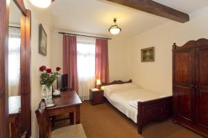 Postel nebo postele na pokoji v ubytování Hotel Retman