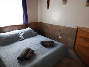 Cama o camas de una habitación en Cabañas Anakena