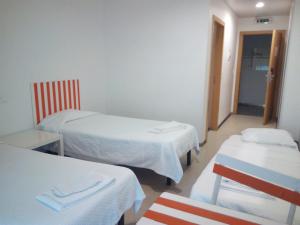 Postel nebo postele na pokoji v ubytování Hi Espinho - Pousada de Juventude