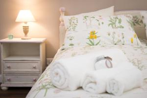 Postel nebo postele na pokoji v ubytování Magnolia St.Peter's Suites
