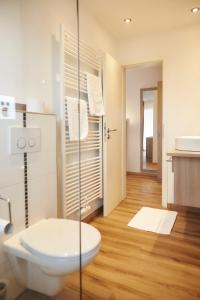Koupelna v ubytování Flair Hotel Grüner Baum + 37 fotografií