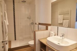 Koupelna v ubytování Flair Hotel Grüner Baum
