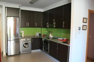 Apartamento Do Lar tesisinde mutfak veya mini mutfak