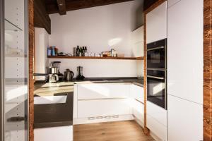 Kuchyň nebo kuchyňský kout v ubytování Top modernes Ferienhaus mit Sauna! Nicht weit vom Skilift