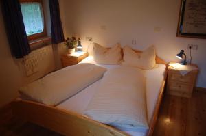 Postelja oz. postelje v sobi nastanitve Agriturismo Feur Hof