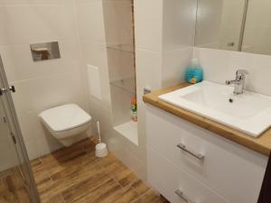Kúpeľňa v ubytovaní Nordic Apartamenty św.Mikołaja