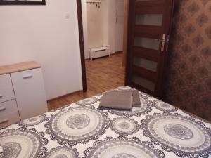 Posteľ alebo postele v izbe v ubytovaní Nordic Apartamenty św.Mikołaja
