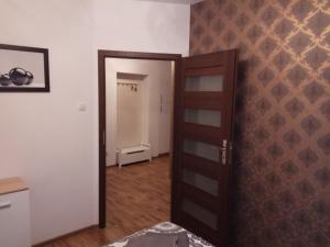 Posteľ alebo postele v izbe v ubytovaní Nordic Apartamenty św.Mikołaja