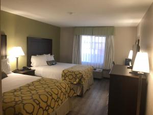 Letto o letti in una camera di Baymont by Wyndham Phoenix I-10 near 51st Ave