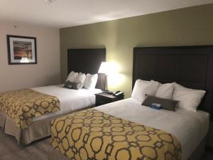 Letto o letti in una camera di Baymont by Wyndham Phoenix I-10 near 51st Ave