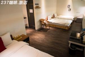 Postel nebo postele na pokoji v ubytování 237 Hotel