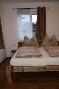 A bed or beds in a room at Kornihof