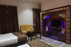 O zonă de relaxare la Jaipur Hotel New - Heritage Hotel