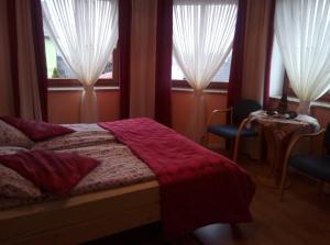 Łóżko lub łóżka w pokoju w obiekcie Willa na Skarpie