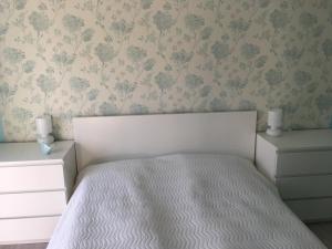 Posteľ alebo postele v izbe v ubytovaní Happy Mammy Bababarát Apartmanház 1 - Hűvös utca
