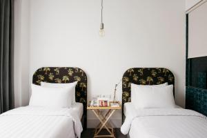 Letto o letti in una camera di Hotel Monopoli