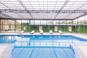 Bazén v ubytování LADALAT Hotel nebo v jeho okolí