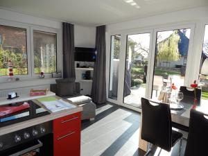 Η κουζίνα ή μικρή κουζίνα στο TiWu - Ferienwohnungen