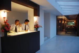 Členové personálu v ubytování Hotel Palace Heights