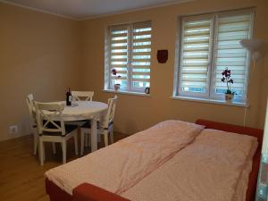 Posteľ alebo postele v izbe v ubytovaní Apartament Na Wzgórzu