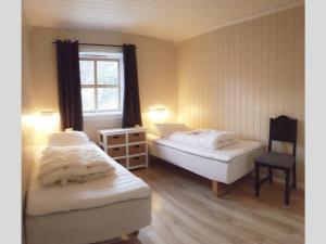 Ein Bett oder Betten in einem Zimmer der Unterkunft Ålfotevegen 5