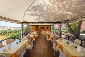 Restoranas ar kita vieta pavalgyti apgyvendinimo įstaigoje Luna di Ponente