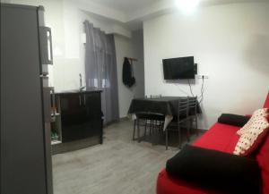 TV a/nebo společenská místnost v ubytování Temporary Alicante TM