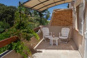 Balkón nebo terasa v ubytování L' Escapade Hôtel & Restaurant