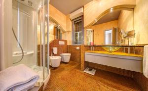 Ванная комната в Hotel Waldorf- Premier Resort