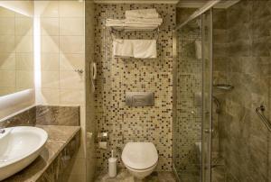 
Een badkamer bij Riviera Hotel & Spa
