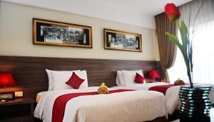 Ένα ή περισσότερα κρεβάτια σε δωμάτιο στο Puri Kesari Guest House +41 φωτογραφίες