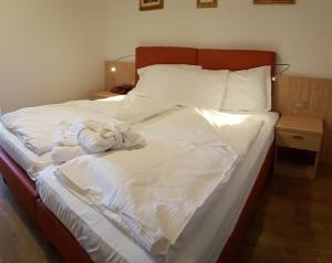 Rúm í herbergi á Hotel Olimpic