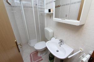 Koupelna v ubytování Apartments Milka