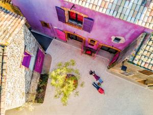 Televiisor ja/või meelelahutuskeskus majutusasutuses Village Castigno - Wine Hotel & Resort