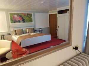 Postel nebo postele na pokoji v ubytování Hotel Restaurant Kniebishöhe