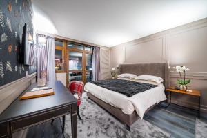 Voodi või voodid majutusasutuse Hotel Spinale toas